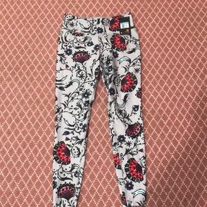 Nike floral “legend tight” leggings